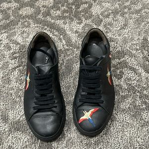 Axel Arigato black bird sneaker